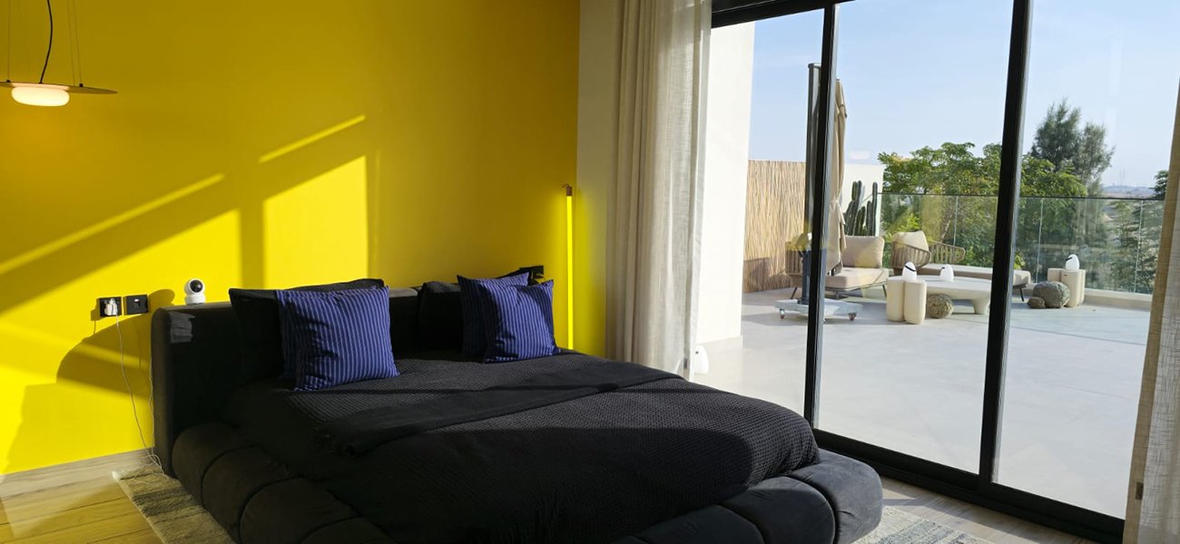 bedroom with balcony hayyan show villa